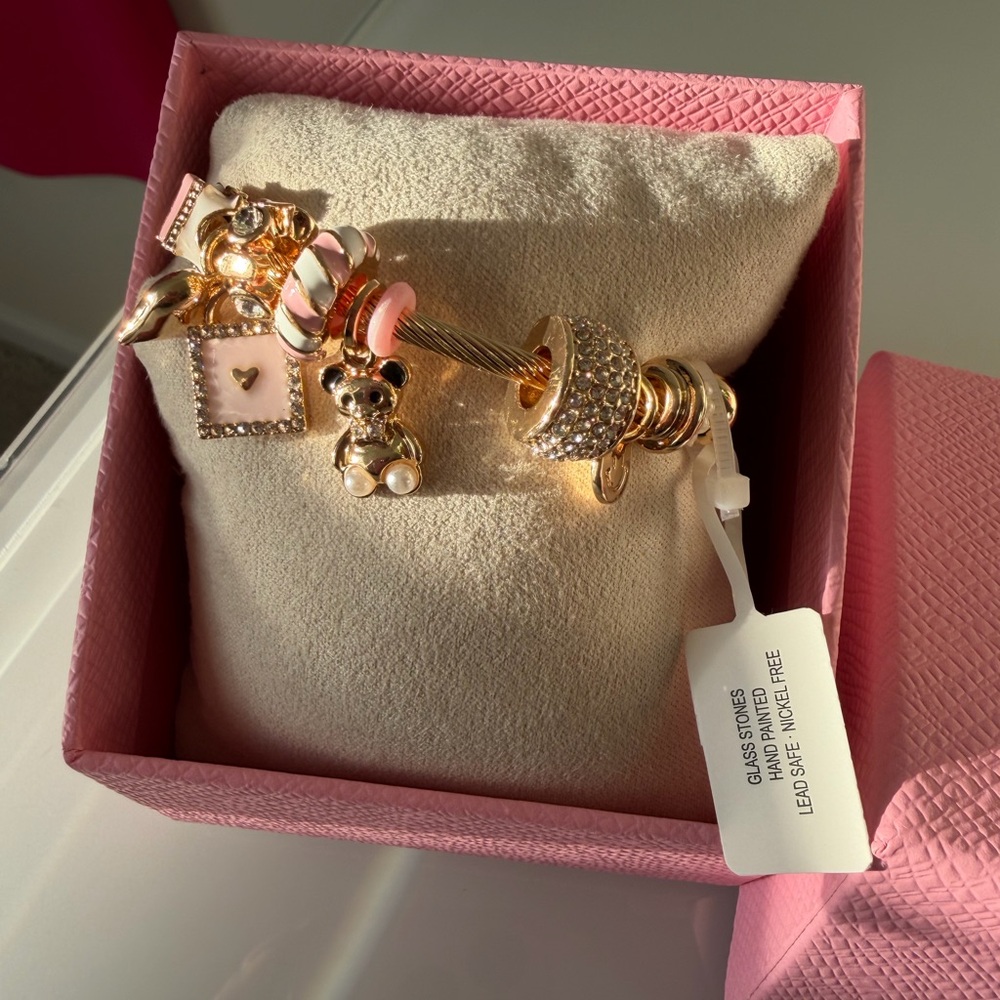 Gold teddy bear pink charms bracelet
